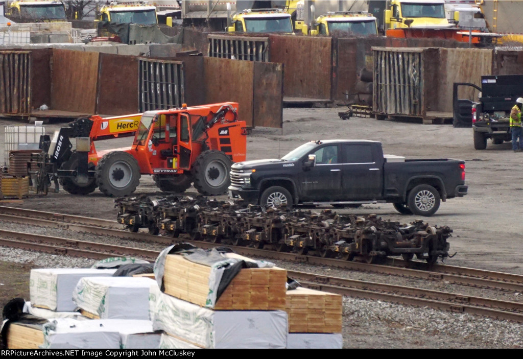 Trucks awaing loading into containers